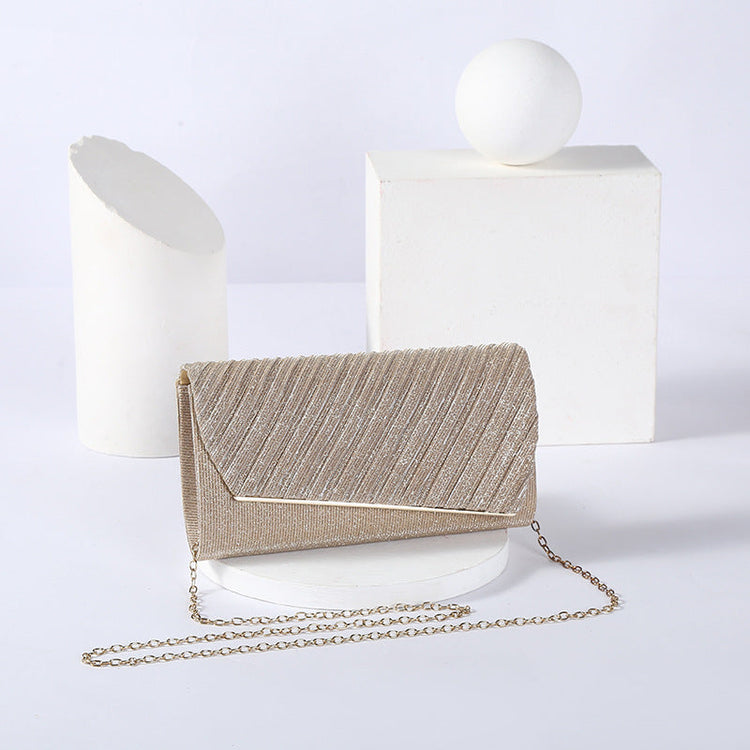 Shimmering Asymmetric Flap Evening Purse with Metal Trim